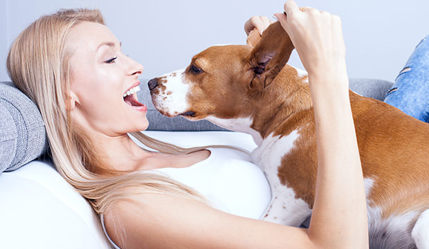 bigstock-Happy-Blonde-Girl-With-Beagle--99366575