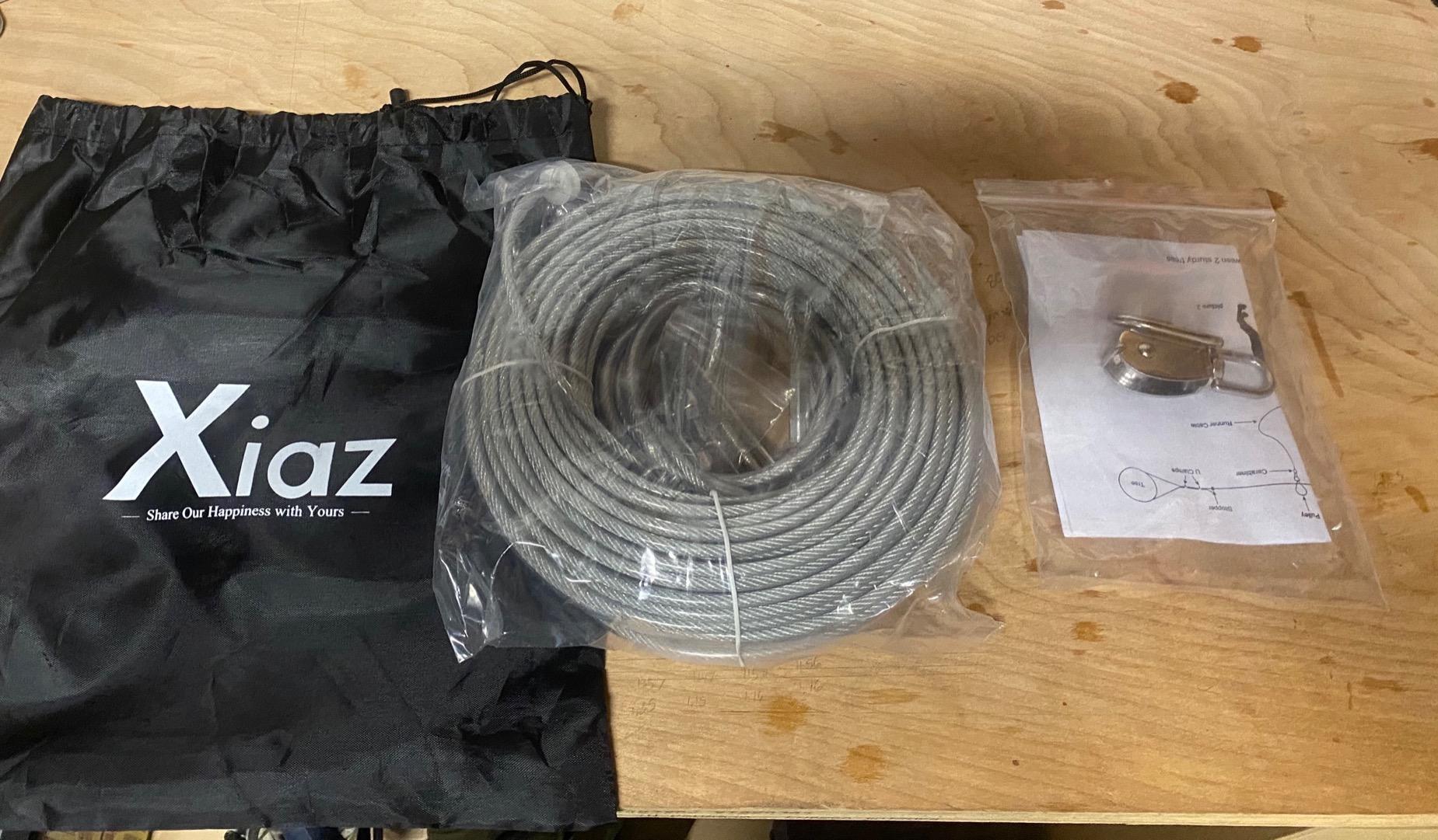 XiaZ Dog Tie Out Cable, 100ft Dog Trolley Runner Cable for Dogs up to 250lbs, Pet Lead for Yard, Camping, Outdoor, with 8 Ft Nylon Bungee Runner, Cable Sling to Protect Trees customer photo 1