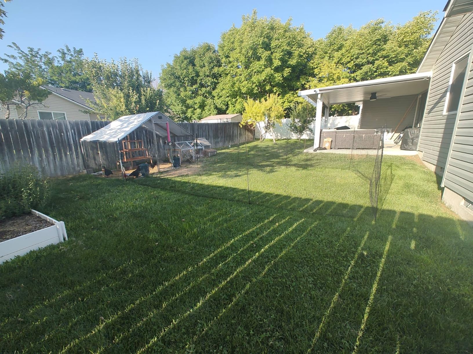 Temporary Fence with Posts, 4'x50' Plastic Fencing Garden Fence Animals Barrier with Fiberglass Stake Windbreak Rope, Portable Snow Fences, Fencing for Dogs Outdoors Backyard (Black) customer photo 1