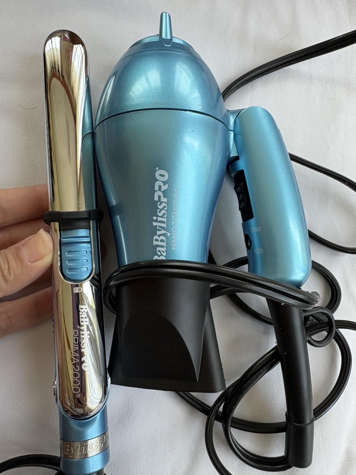 BaBylissPRO Nano Titanium Travel Hair Dryer, 1000 Watt Professional Blow Dryer with Concentrator Nozzle, Foldable Handle, Dual Voltage customer photo 1