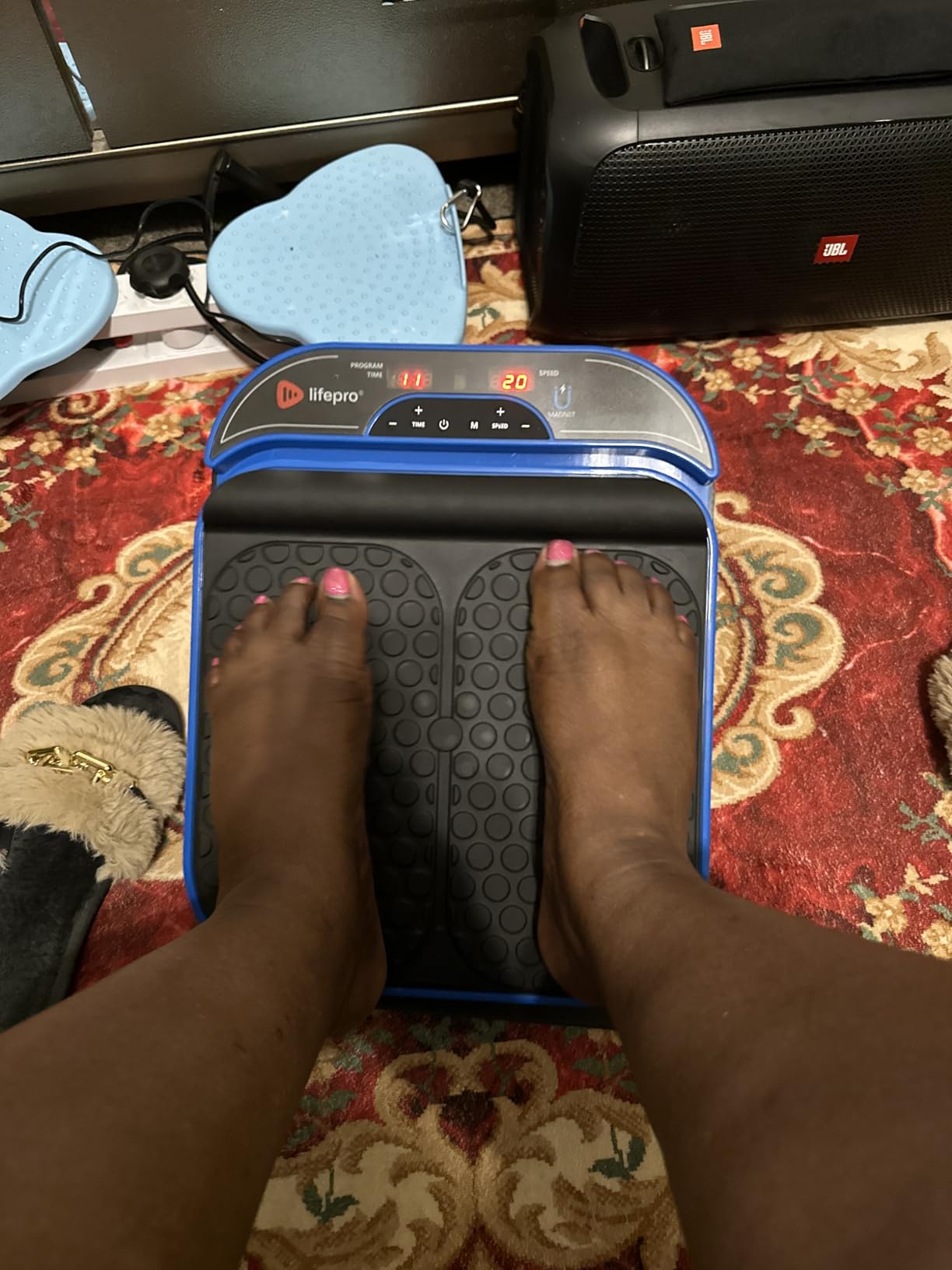 LifePro VibraFlow Feet Massager Electric Comfort & Circulation Support | Supports circulation with 30 customizable speeds, 10 preset modes, a magnetic remote holder, and dual textured pads. customer photo 1