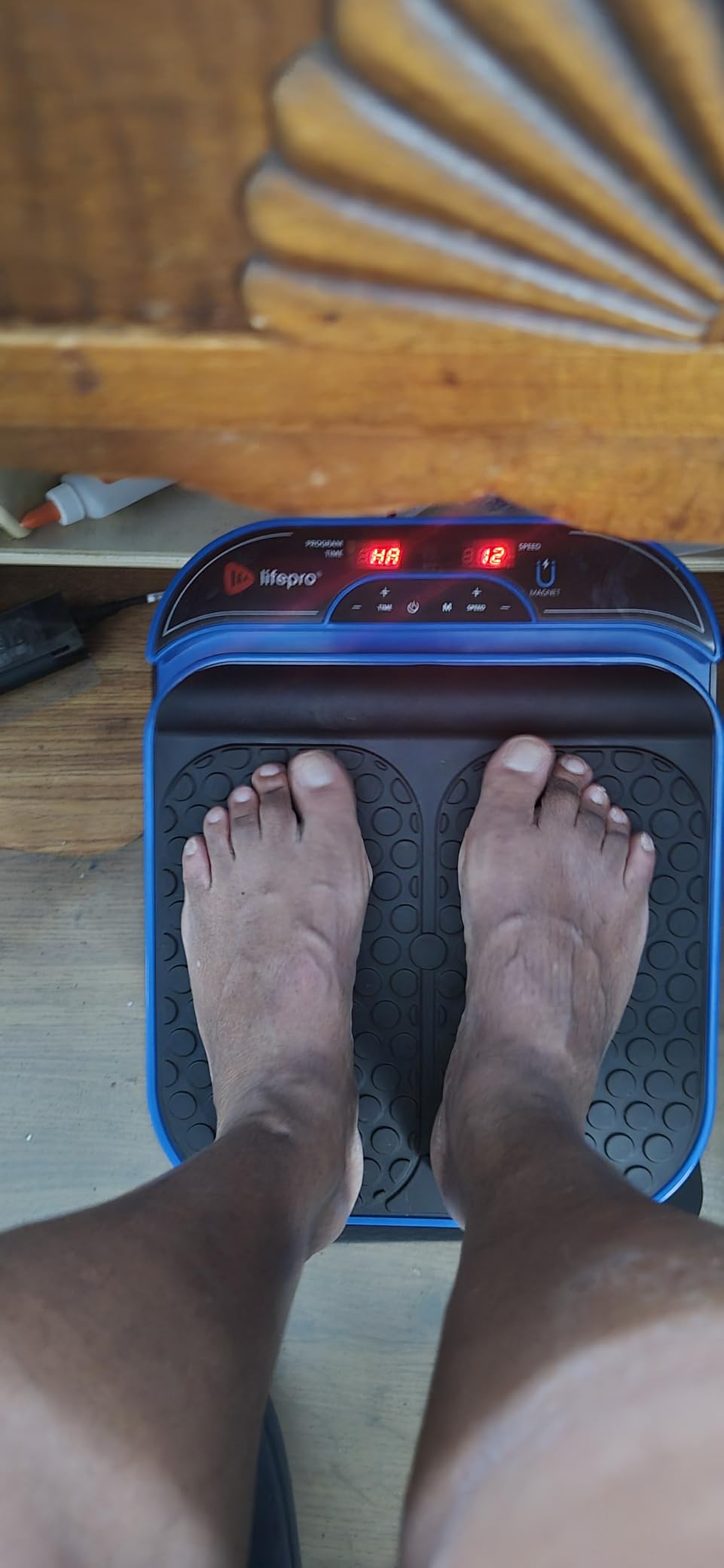 LifePro VibraFlow Feet Massager Electric Comfort & Circulation Support | Supports circulation with 30 customizable speeds, 10 preset modes, a magnetic remote holder, and dual textured pads. customer photo 2