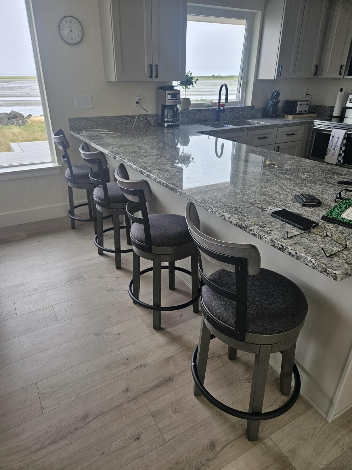 Signature Design by Ashley 1-Piece Swivel Counter Height Bar Stool, Gray | 24-inch seat height, Solid wood base, Metal back supports, Easy-clean polyester upholstery, Nailhead trim, Caitbrook Series customer photo 2