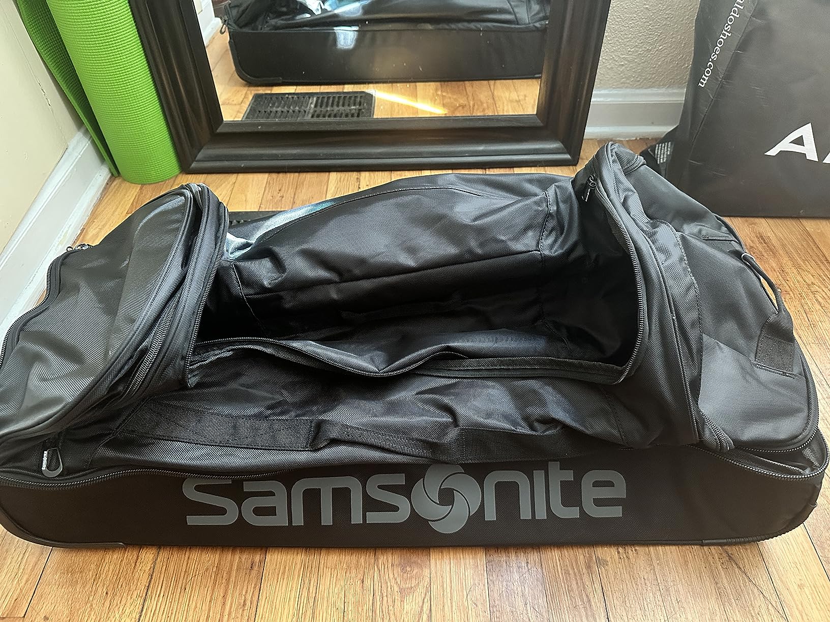 Samsonite Andante 2 Wheeled Duffel Bag - 32-Inch Durable Rolling Luggage with Inline Skate Wheels, Push-Button Handle & Spacious Compartments - Travel-Friendly and Lightweight- Navy/Black customer photo 1