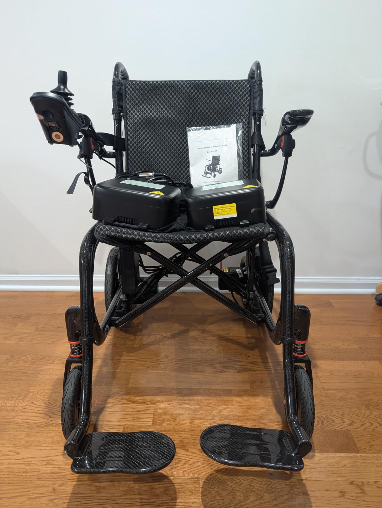 28lbs Ultralight Foldable 100% Carbon Fiber Electric Wheelchair, Bluetooth Control, 28-Mile Range, Dual Batteries, Airline Approved customer photo 1