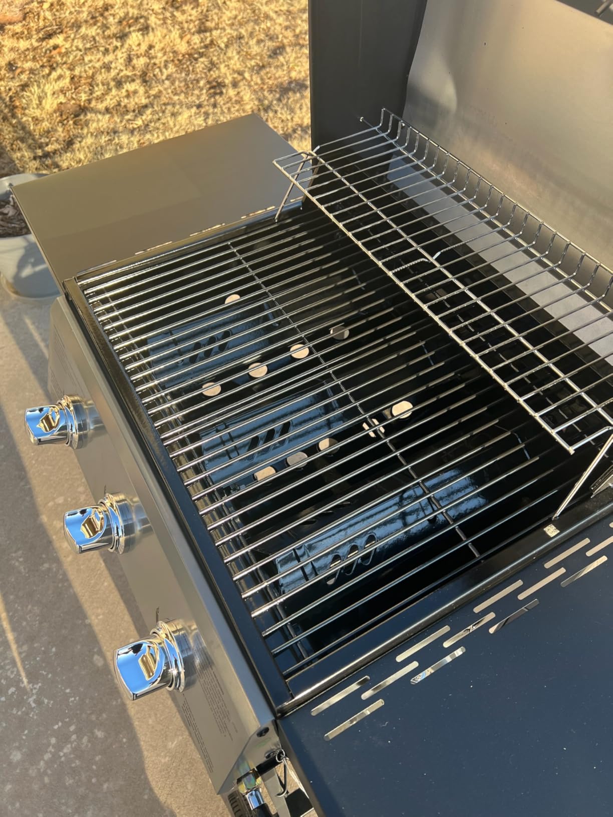 Grill Boss 4-Burner Outdoor Propane Gas Grill with Side Shelves, Stainless Steel Lid, Push Ignition, Warming Rack, Wheels, Black customer photo 1