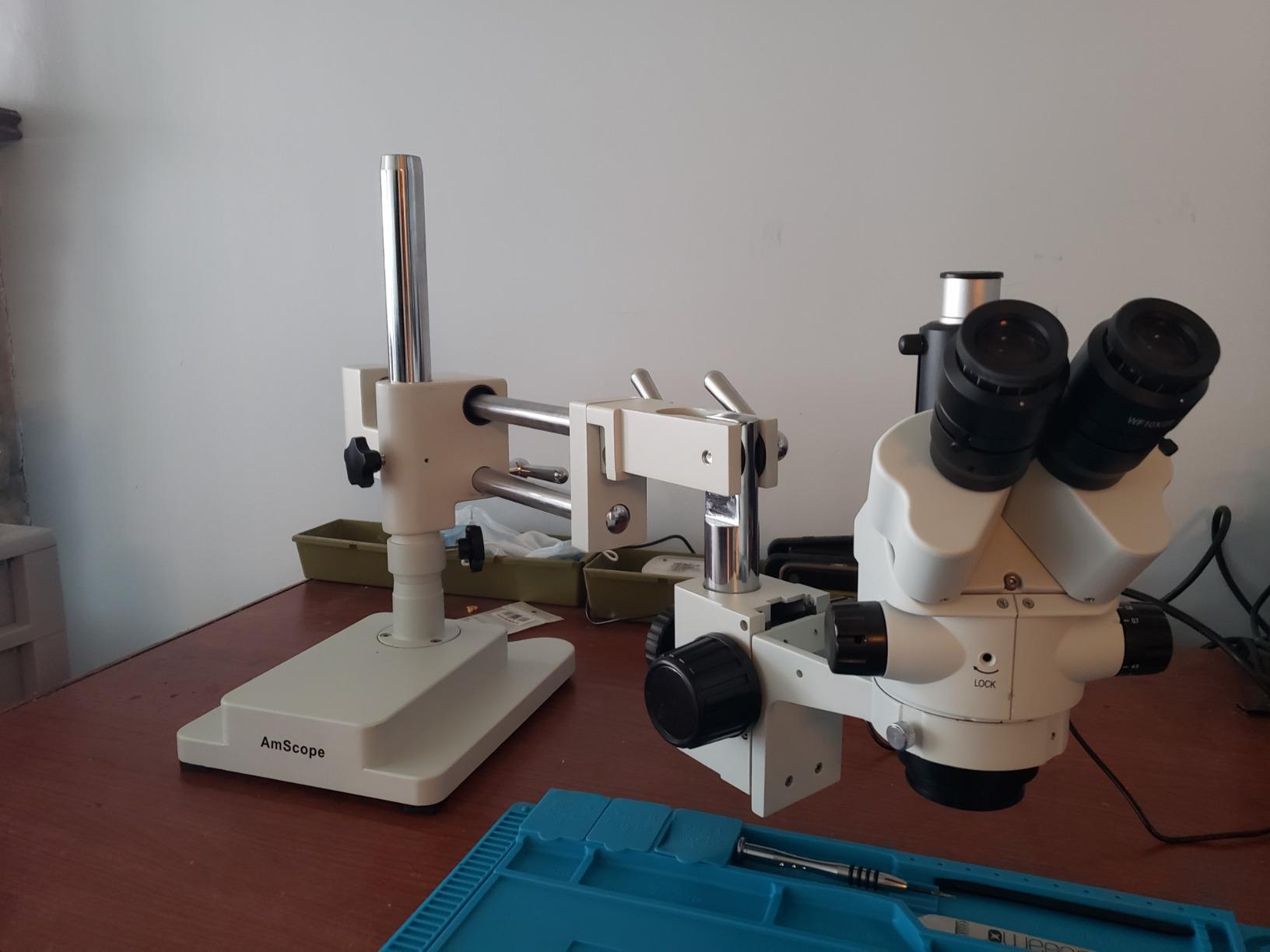 AmScope SM-4NTP 45X Simul-Focal Stereo Lockable Zoom Microscope on Dual customer photo 1