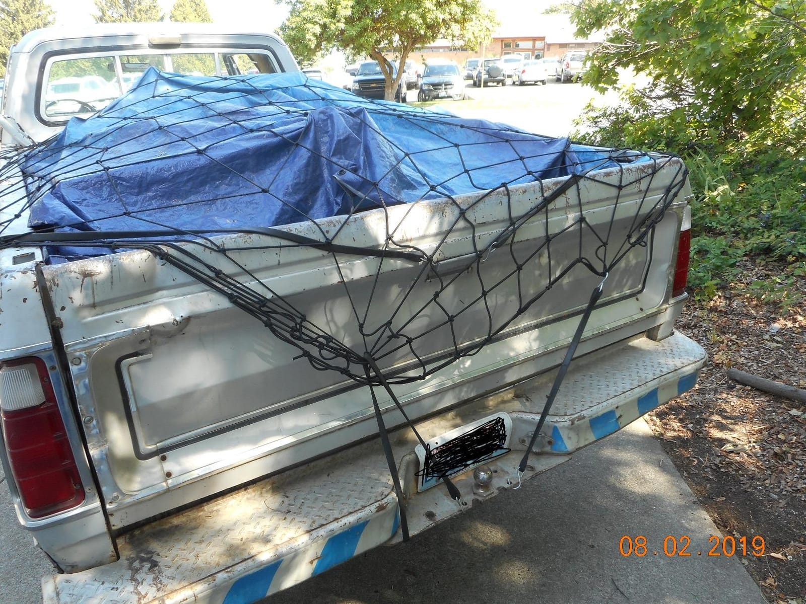 Truck Bed Cargo Net - 4 x 6 Foot, Heavy-Duty Elastic Mesh with 12 Black Clips and Storage Bag for Pickup for Cargo Netting, Securing Loads in Trailers, SUVs & Roof Racks customer photo 2
