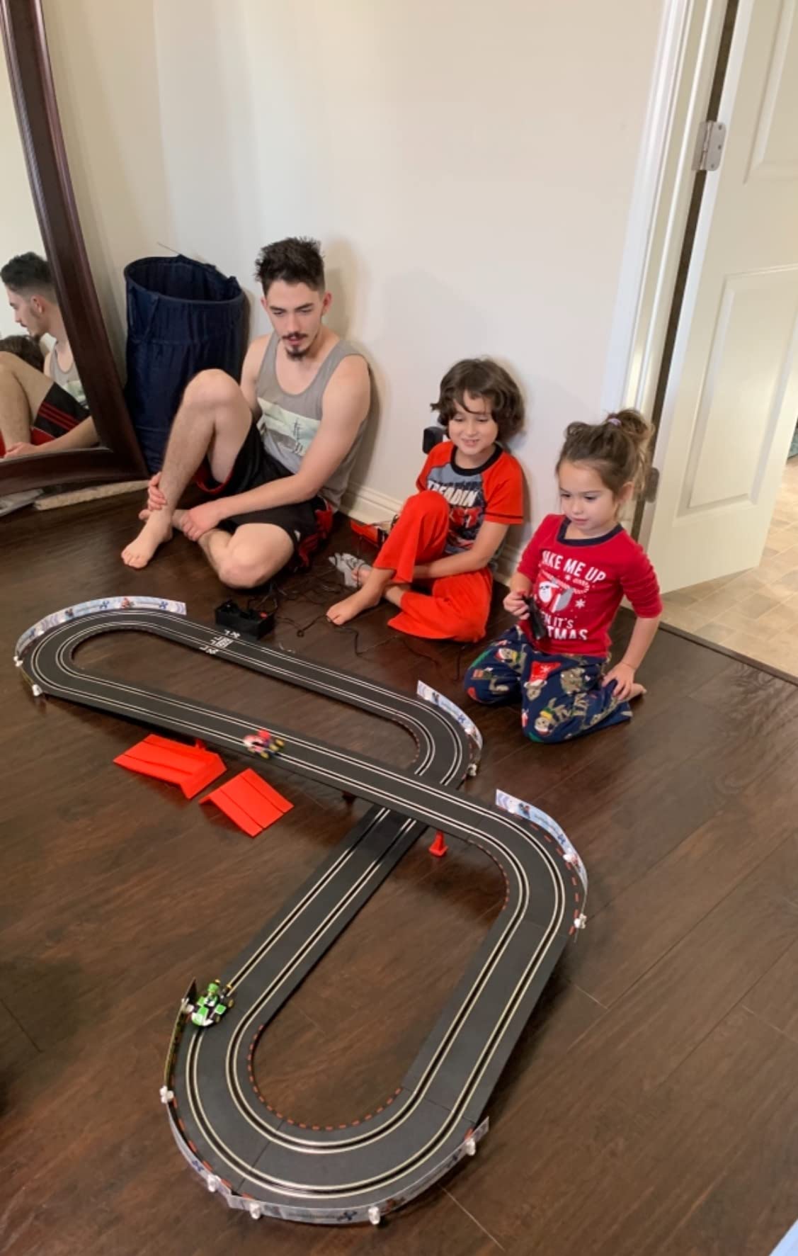 Carrera GO Mario Kart Slot Car Race Track Set - Battery Powered (Ages 5+) | Battery-powered slot car track, Mario Kart toy for kids 5+, includes Mario & Luigi cars, jump ramp, 14.1-ft track customer photo 1