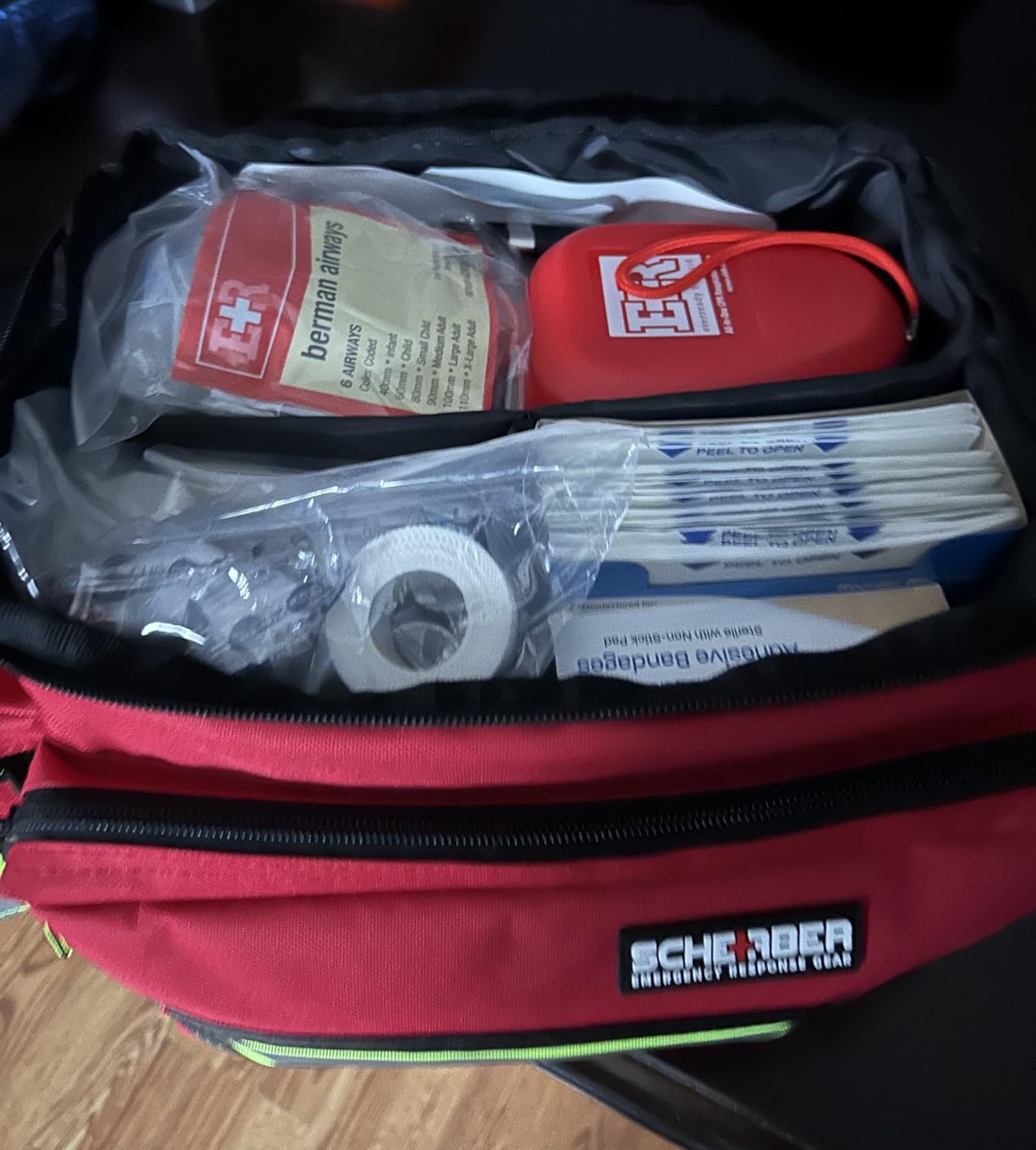 Scherber First Responder Fully-Stocked Professional Essentials EMT/EMS Trauma Kit | HSA/FSA Approved | Reflective Bag w/8 Zippered Pockets & Compartments & 200+ First Aid Supplies - Red customer photo 2