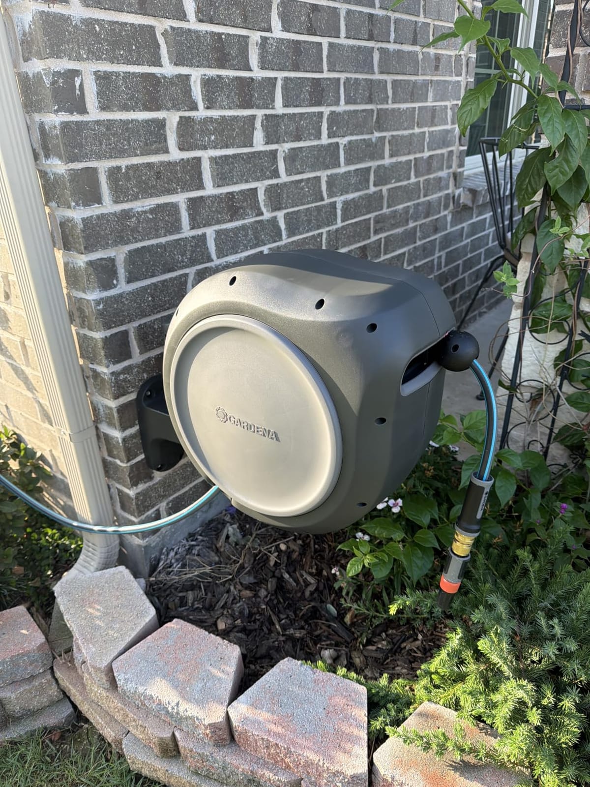 GARDENA Retractable Garden Hose Reel - 100 Feet - Auto Retract Hose Reel with 180° Swivel Wall Mount - Heavy Duty - Includes Spray Nozzle - 20505 customer photo 2