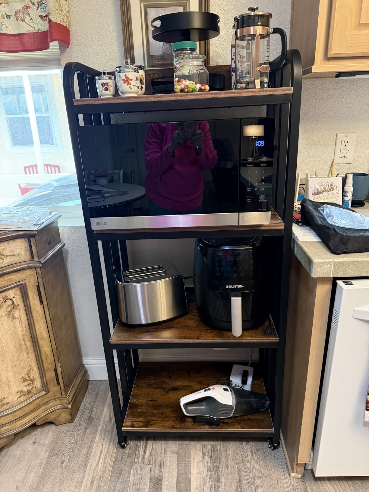 4-Tier Kitchen Bakers Rack with Power Outlet and Rolling Wheels, Microwave Stand with Storage, Adjustable Kitchen Shelves Freestanding, Coffee Bar Station, Bakers Rack for Spices, Pots and Pans, Brown customer photo 1