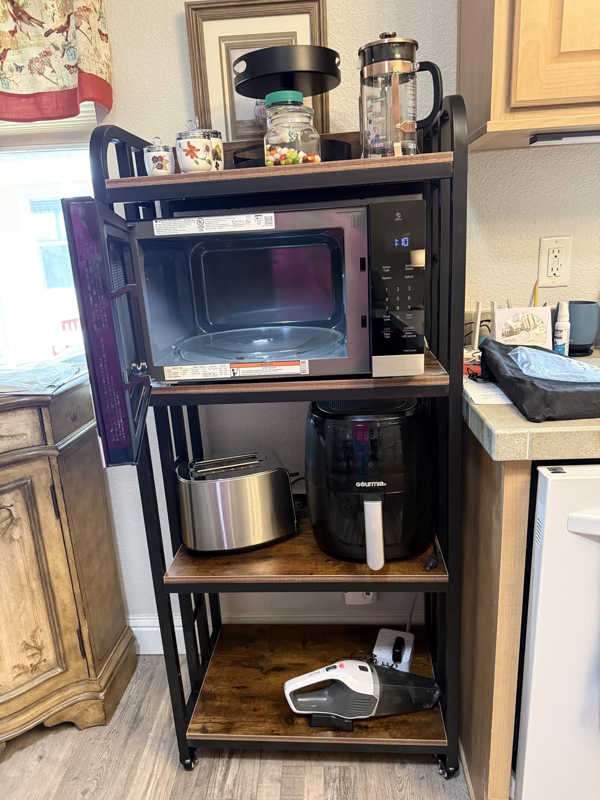 4-Tier Kitchen Bakers Rack with Power Outlet and Rolling Wheels, Microwave Stand with Storage, Adjustable Kitchen Shelves Freestanding, Coffee Bar Station, Bakers Rack for Spices, Pots and Pans, Brown customer photo 2