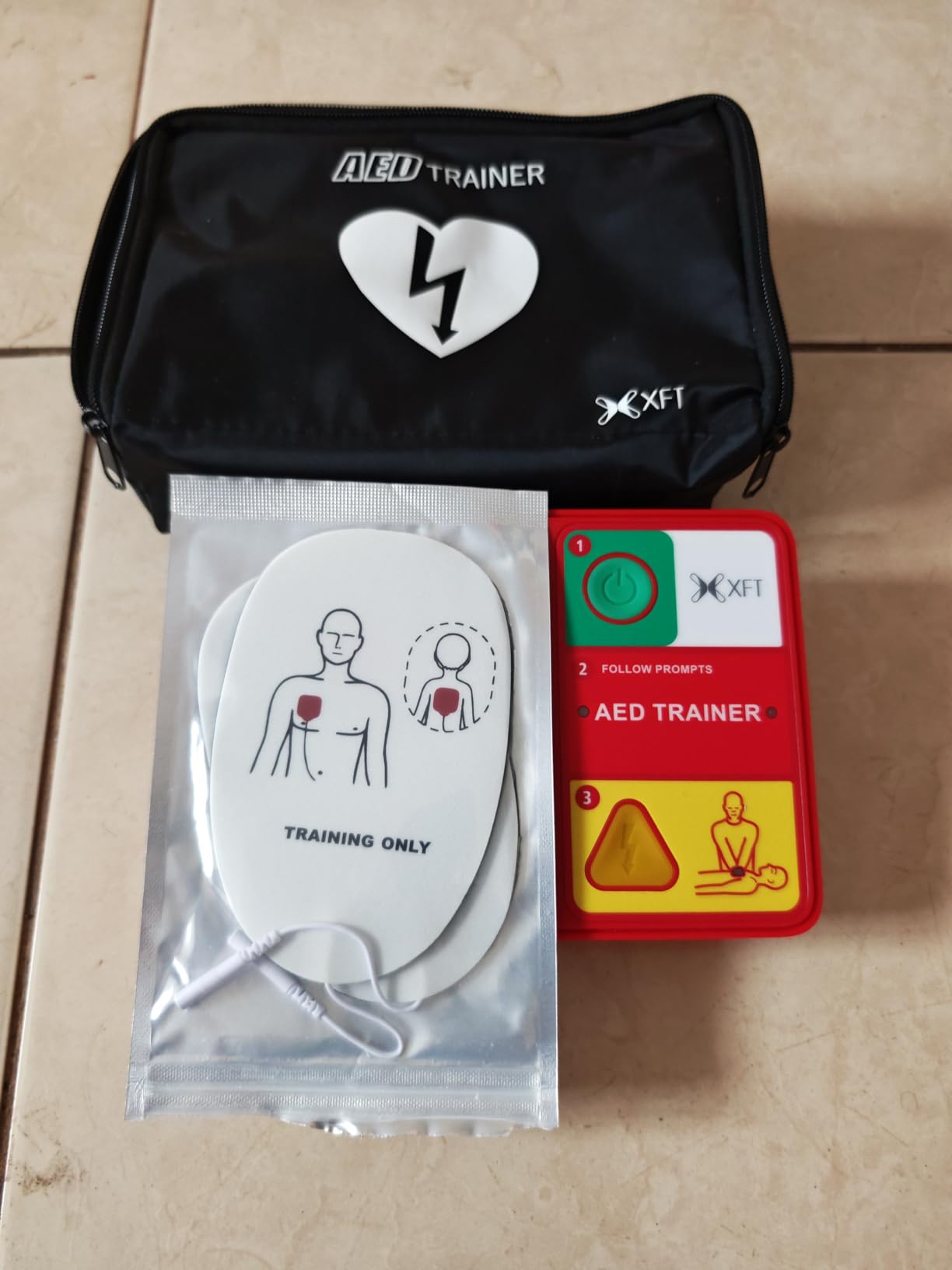AED Trainer & AED Simulator & AED Defibrillator for Home, Lightweight CPR Practice Device, Portable Defibrillator Training for First Aid Beginners (XFT-120N) customer photo 1