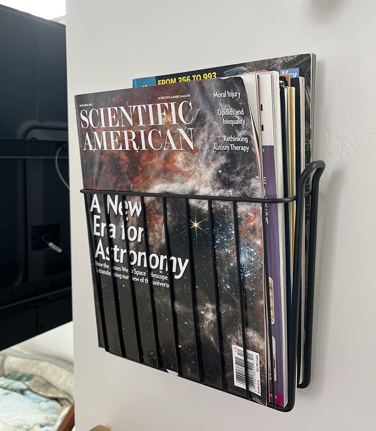 mDesign Metal Wall Mount Decorative Magazine Rack Organizer Bin Holder, Basket for Living Room, Bathroom, Bedroom, Home Office - Holds Books, Newspapers, Tablets - Concerto Collection - Black customer photo 2