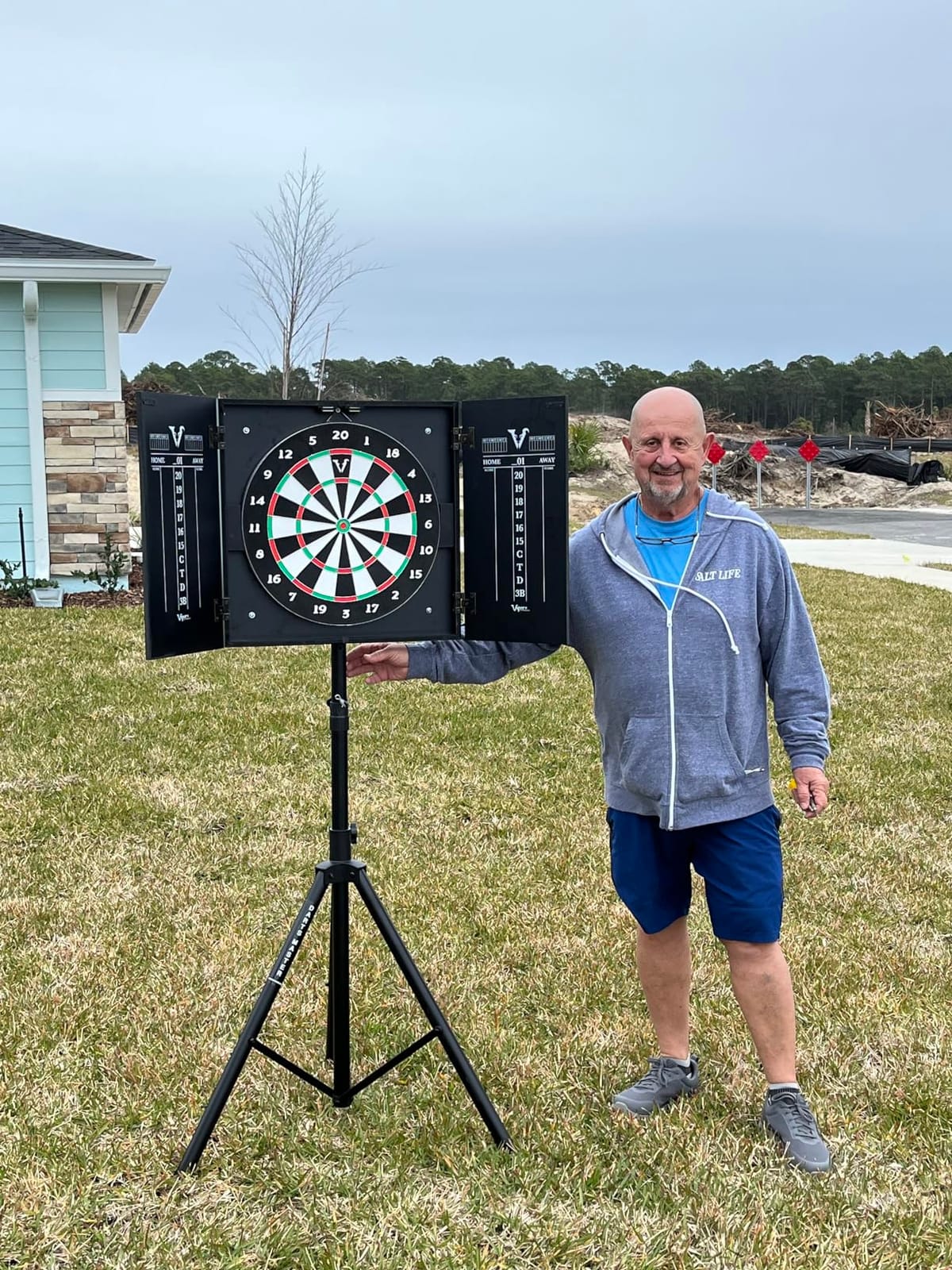 Viper Hideaway Dartboard Cabinet Set with Steel-Tip Dart Board, Reversible Board with Baseball Game Option, Two Sets of Darts, Chalk Scoreboards, and Matte Black Finish customer photo 1
