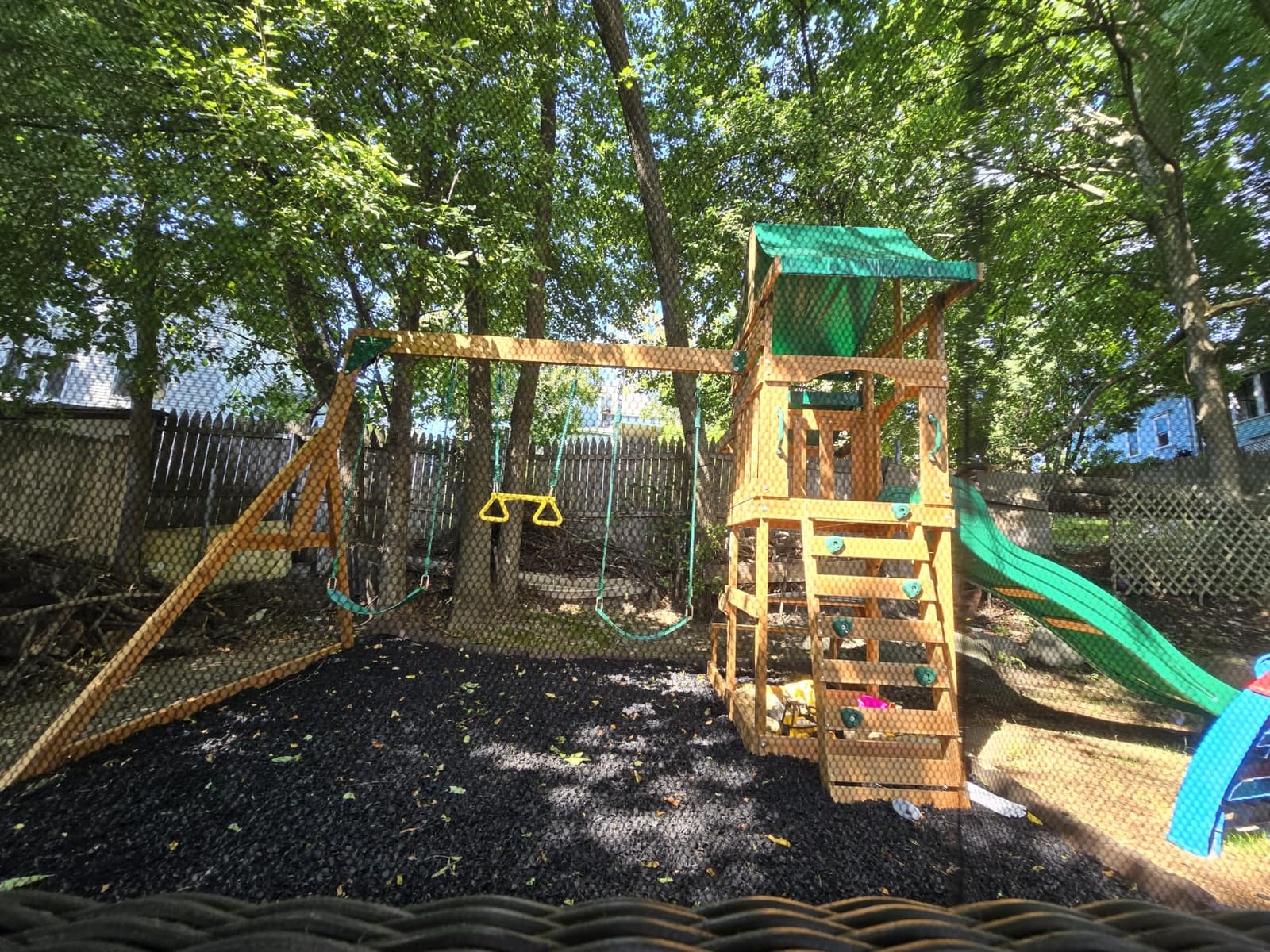 Backyard Discovery Beach Front Cedar Wood Swing Set with Wave Slide, Play Deck, Monkey Bars, Rock Wall Ladder, Shaded Picnic Area, Snack Bar, Belt Swings, Trapeze, Sandbox Area, Outdoor Playset customer photo 1
