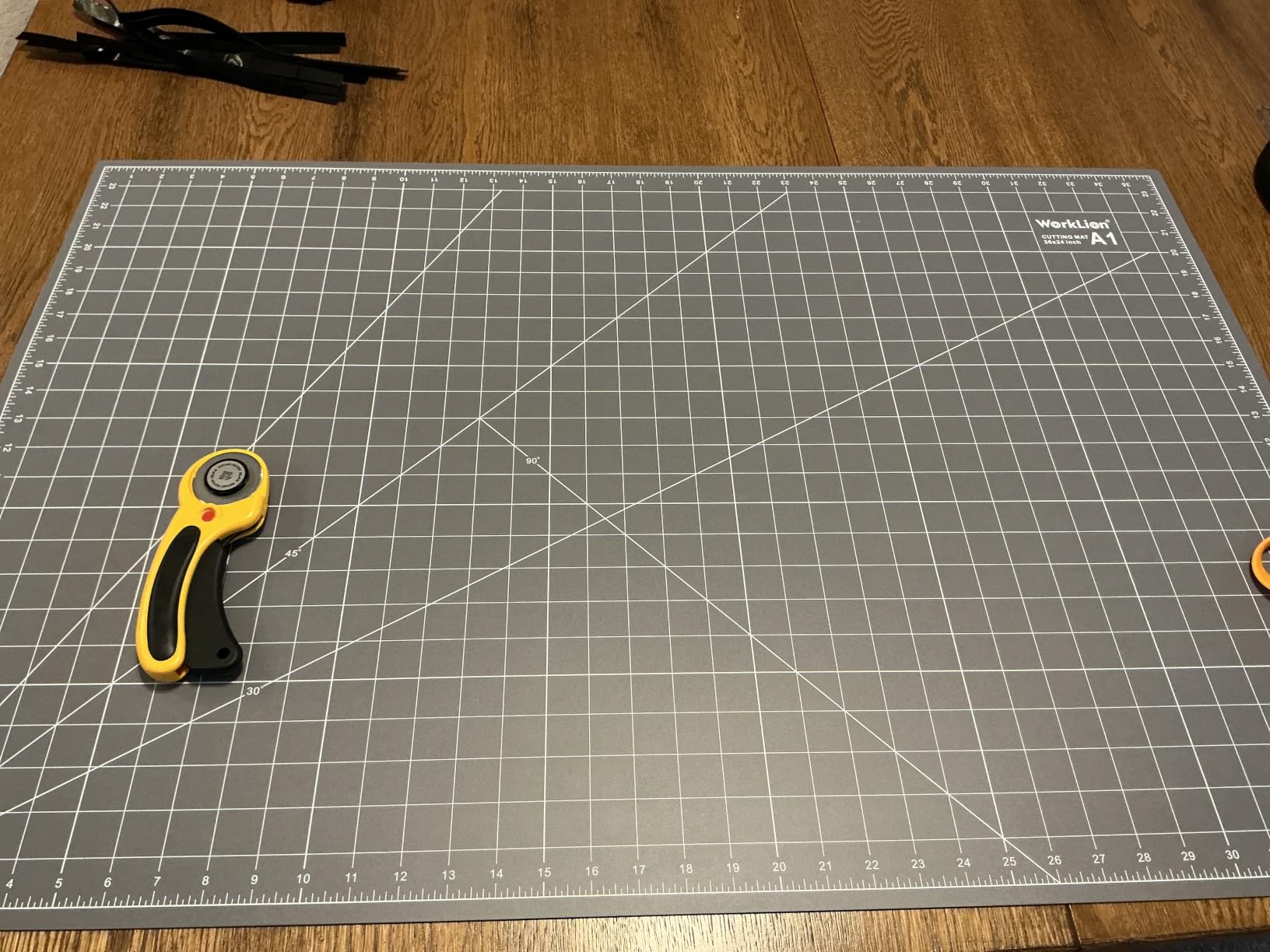 WorkLion Self Healing Cutting Mat 24''x36'': Double-Sided 5-Ply Craft Cutting Board with Grid - Slip-Resistant Large Cutting Mat for Sewing, Fabric,Quilting, Crafts & Hobbies(Grey/Black) customer photo 1