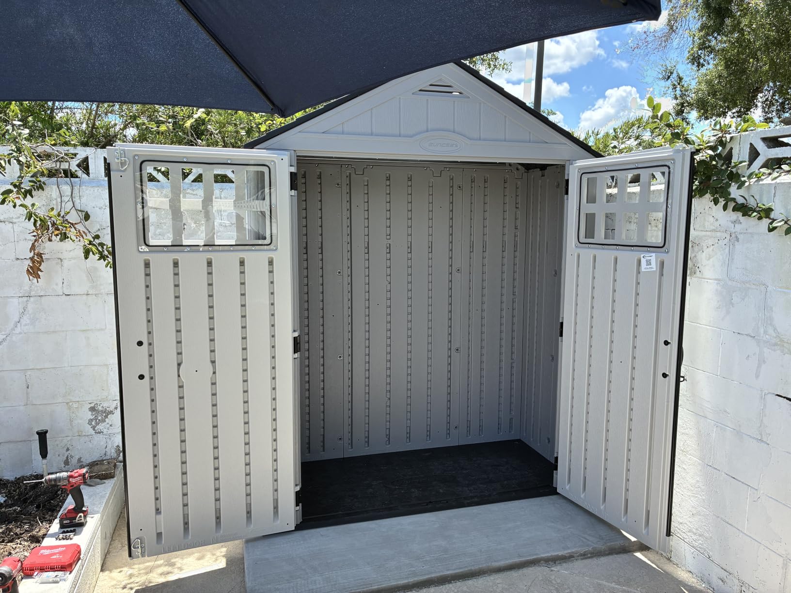 Suncast Everett 6x3 ft Vertical Storage Shed - Resin Outdoor Garden Shed with Floor, Windows, Skylight & Lockable Double Doors. Slim Yard Storage for Utility Tools & Backyard Equipment customer photo 1