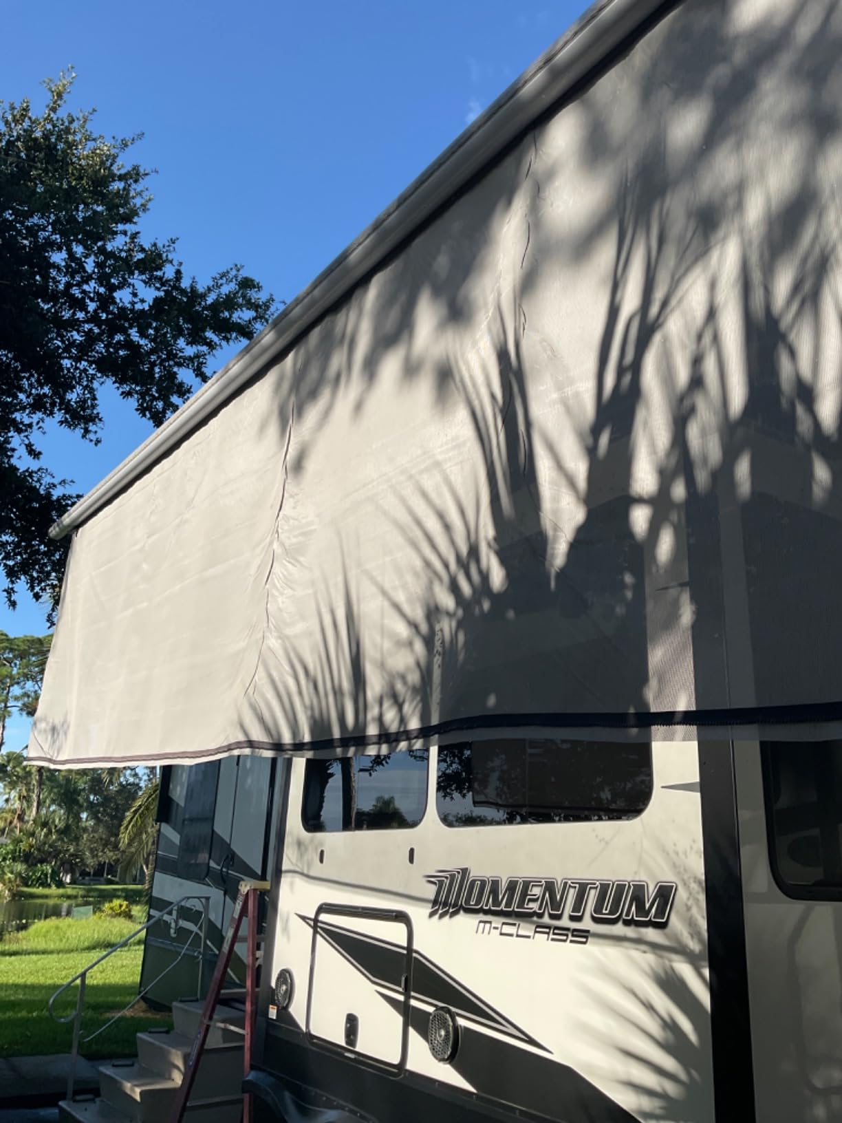 ShadePro - Vista Shade - RV Awning Shade Screen - Zipper Sun Screen Installs in Seconds - Solar Mesh Blocks 87% of Sunlight - The Original Camper Sunscreen Shade for Awnings - 17' x 8' - Black customer photo 1
