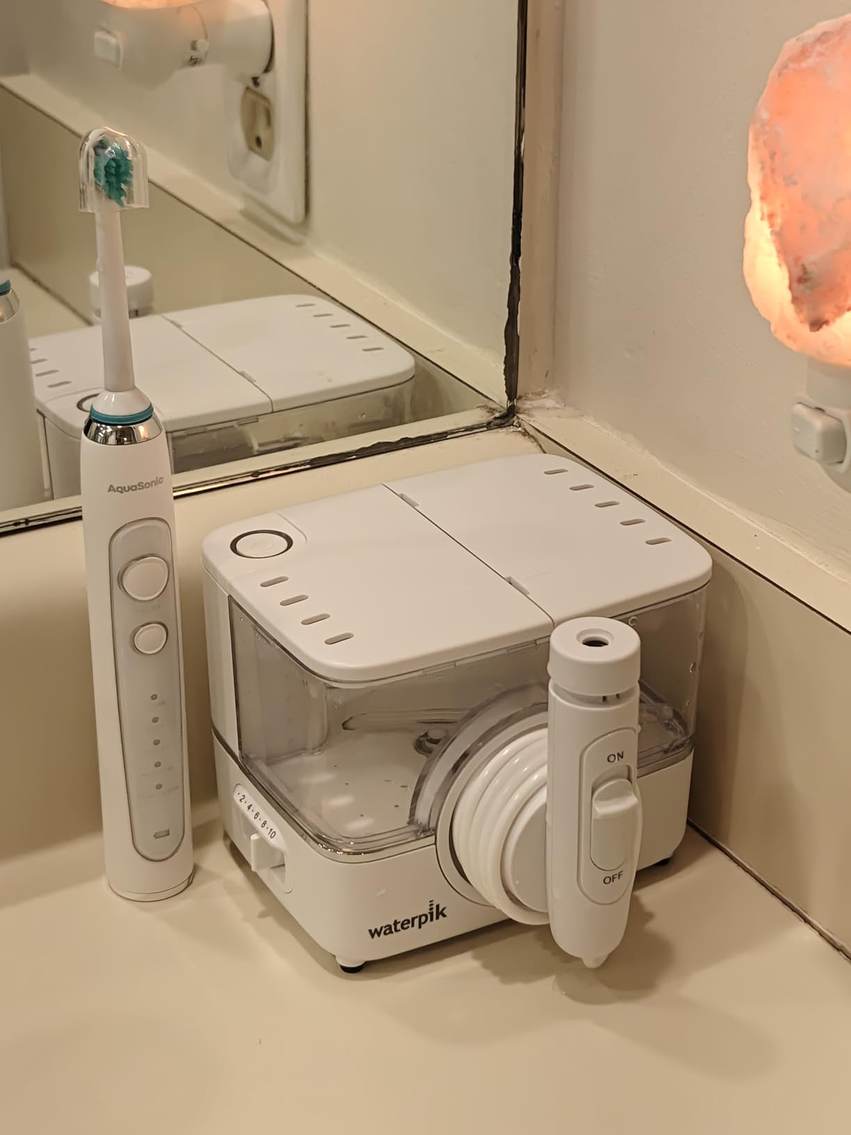 Waterpik ION Rechargeable Water Flosser with 10 Settings, 7 Tips, White customer photo 1